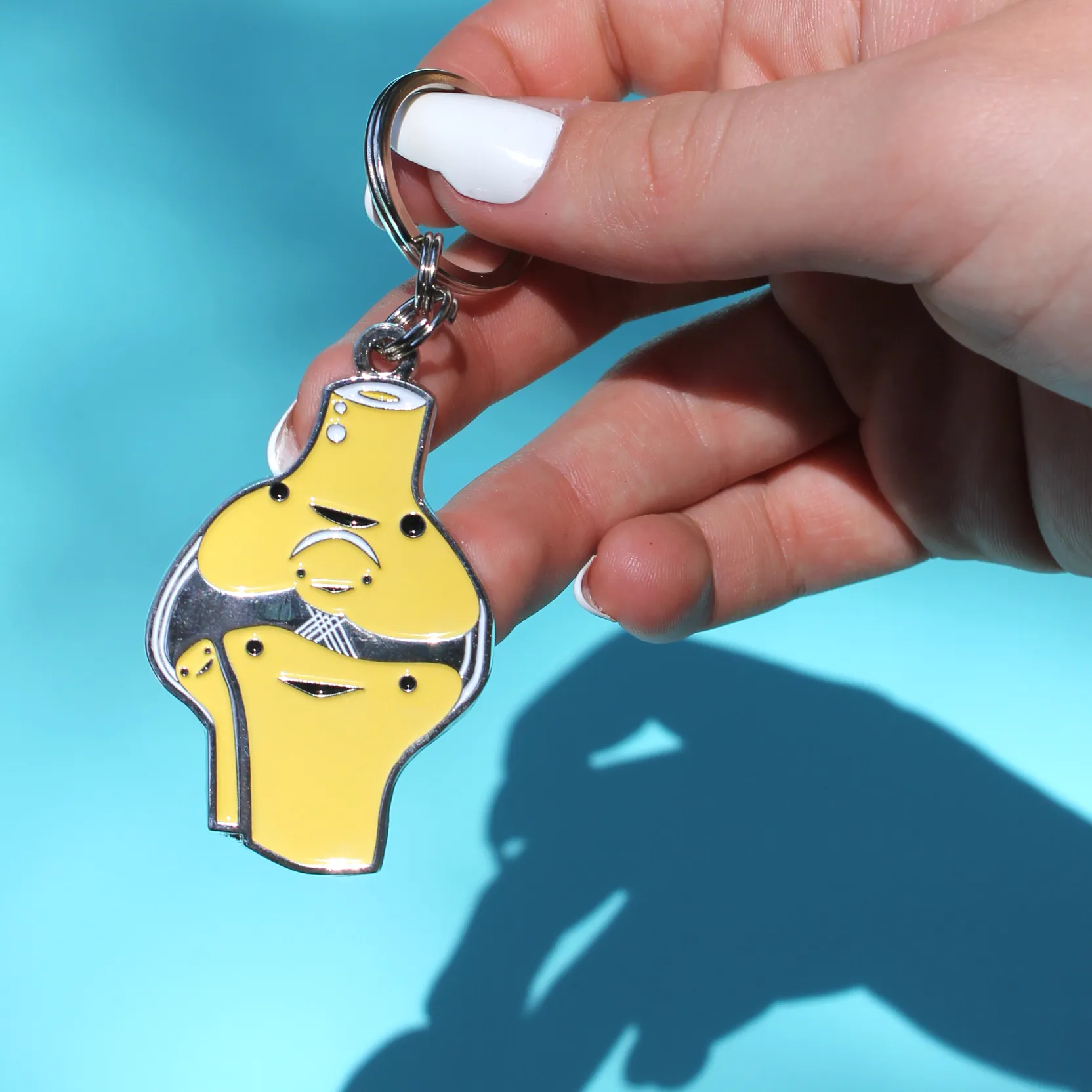 Knee enamel Keychain